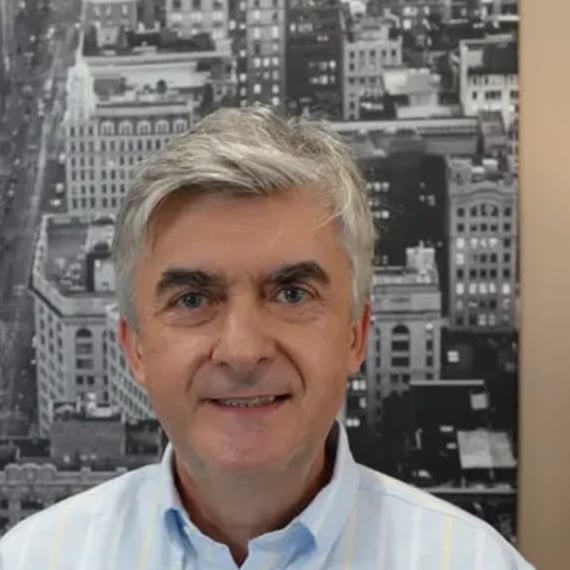Paul, founder and licensed Florida broker, in his Winter Park office